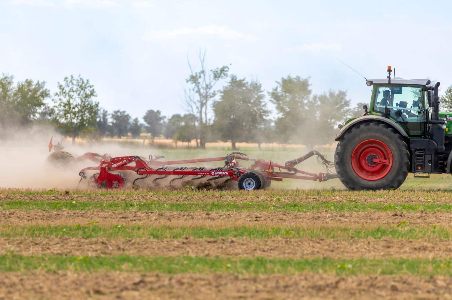 Versatile spring tine cultivator
