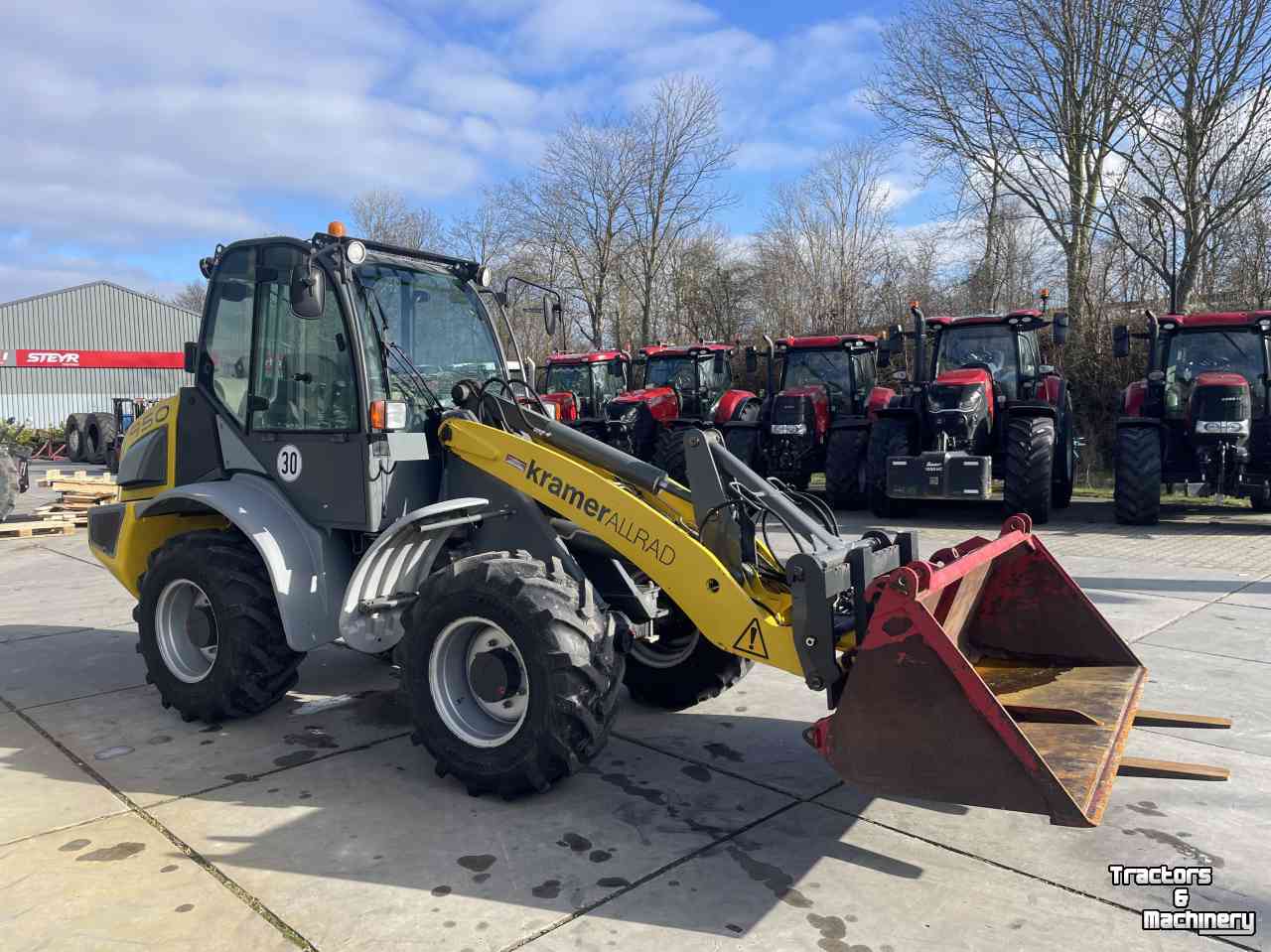 Wheelloader Kramer 950 met bak en nieuwe paletvork