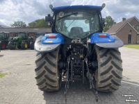 Tractor New Holland T6030 + STOLL ROBUST FR.LDR.