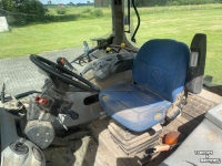Tractor New Holland T6030 + STOLL ROBUST FR.LDR.