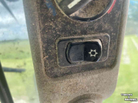 Tractor New Holland T6030 + STOLL ROBUST FR.LDR.