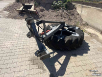 Feed sweeper wheel  Aandrukband